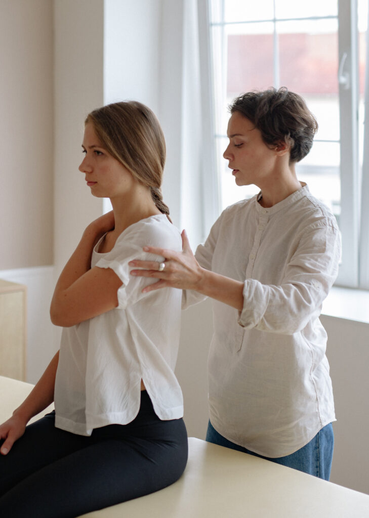 Woman doing shoulder physical therapy